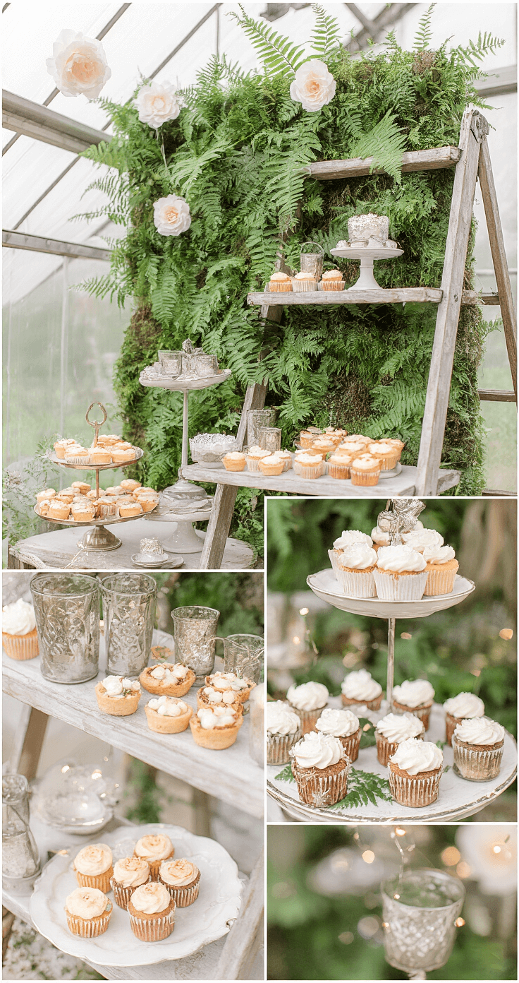 A whimsical dessert display in a greenhouse, featuring an antique ladder as a shelf for petite fours and cupcakes, surrounded by a living wall of ferns and moss, with mercury glass votives casting soft light, a vintage tea cart for champagne, and delicate paper flowers hanging from the ceiling, all enhanced by natural light and twinkle lights, creating an enchanted garden party atmosphere.